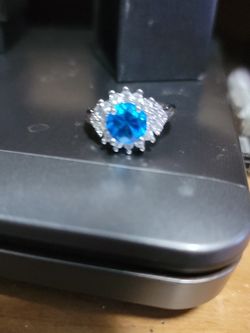 Size 7 Blue Topaz Ring Trimmed In tiny White Sapphire Sterling