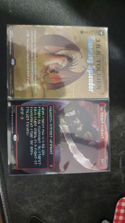 The Reaver Cleaver and  Gleaming Splendor , both full art foil collector's versions.