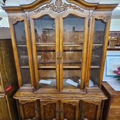 One Piece Walnut China Cabinet

