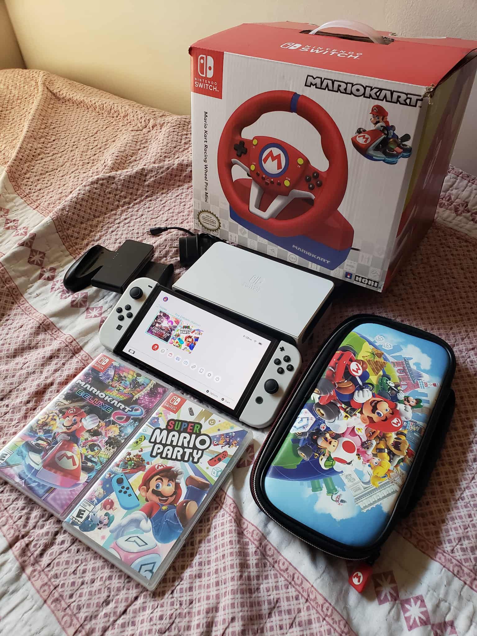 A $350! OLED Nintendo Switch V3 256GB A $140 Racing Kitt, $35 Mario Case & 2 $65 dollar Games is more $500!. I want $350! All combo All you see. Or Tr