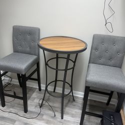 2 Barstools And 1 Table