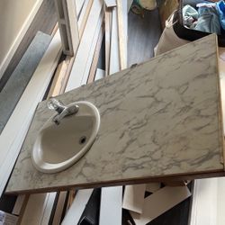 Perfectly Functional 42” Left Off Center Vanity Top With Basin And Faucet. Supply Lines And Drain Included Comes With Huge Mirror As Well! 