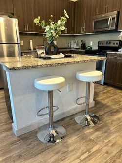 Adjustable White Leather Barstools (x2), (2’5” H x 1’1” W)