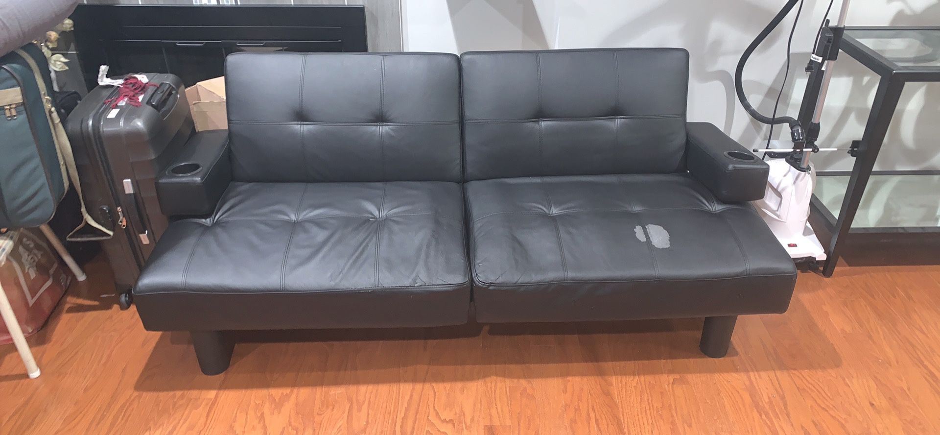 Black leather Futon with cup holder stand