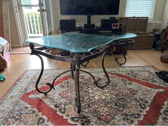 Two glass tables