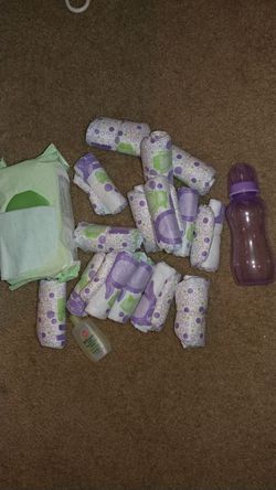 15 size newborn diapers,new wipes, new bottle