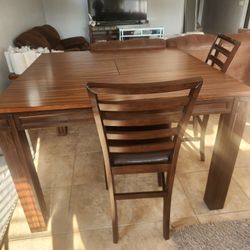 Dining table with four chairs used like new