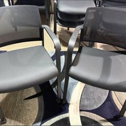 Costway, set of two armed chairs with wheels. New!