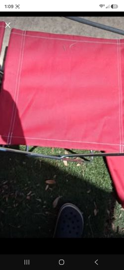 Red X folding chairs