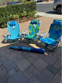 Tommy Bahama beach chairs with umbrella.