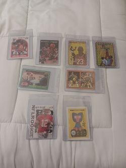 6 sports cards and 2 non sports cards,