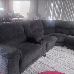 Sectional couch with recliners