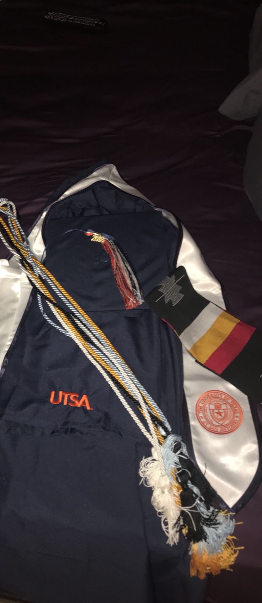 UTSA cap & 2018 tassel, gown, UTSA stole of gratitude