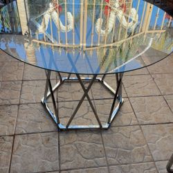 Glass table  and chairs 