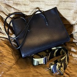 K.Carroll Handbag In Black Vegan Leather With Adjustable Camo Guitar Strap .