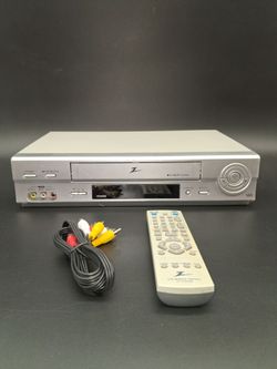 Zenith, VCR with remote and cable.  Works fine.