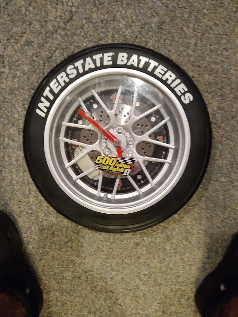INTERSTATE BATTERIES WALL CLOCK JUST A WALL DECORATION CLOCK WONT RUN STILL COOL LOOKIN.