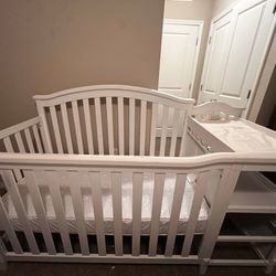 White Berkley Baby crib and changer