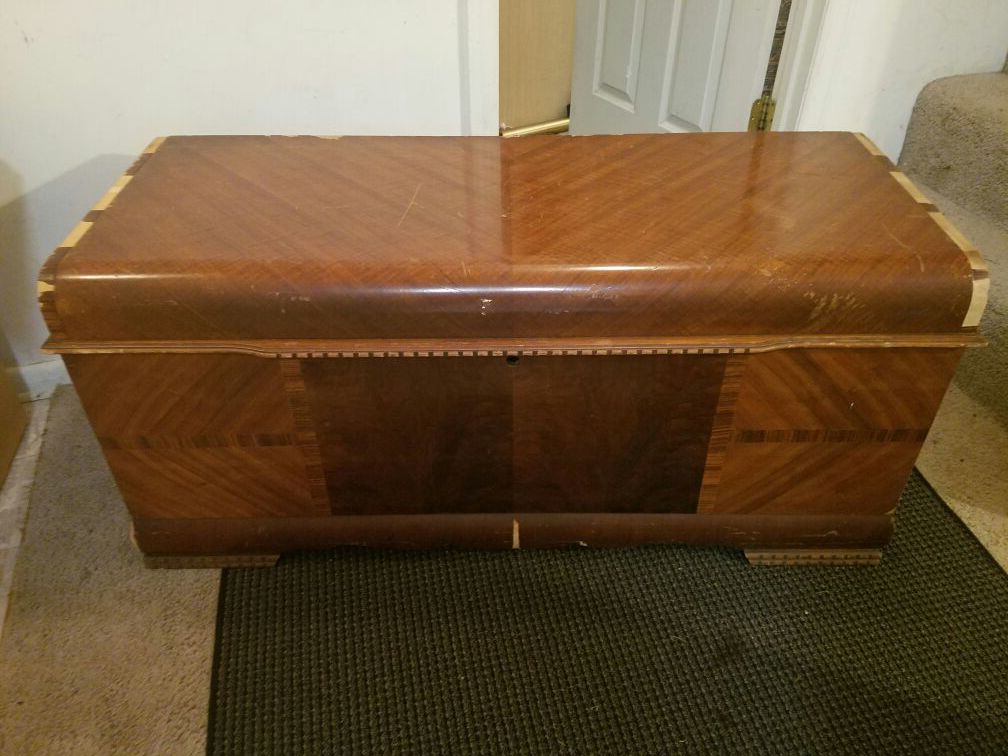 Vintage wooden storage chest with shelf
