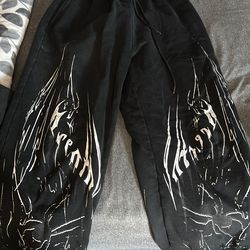 Cuffed Breathe Divinity sweats.