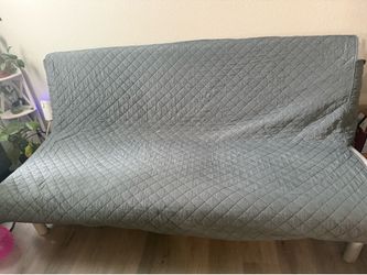 Futon - opens into queen size bed