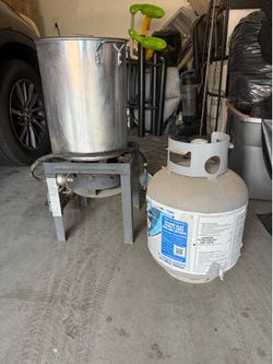 100qf loco cooker with burner and propane full. It has been collecting dust in my backyard.