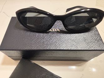 New Prada sunglasses (minor scratches)