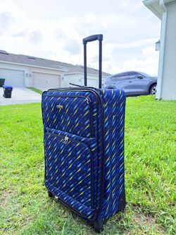 Large checked luggage, 31 x 12 x 8.5 in.