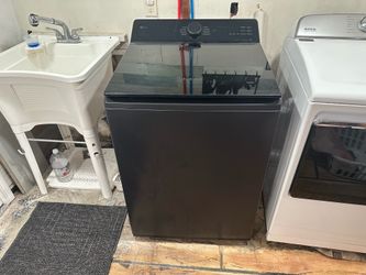 LG 5.5 cu. ft. Mega Capacity Smart Top Load Washer Model: WT8400CB (Matte Black)