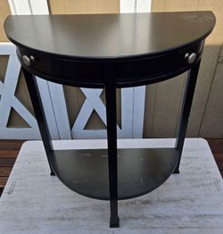 Half moon shape table.