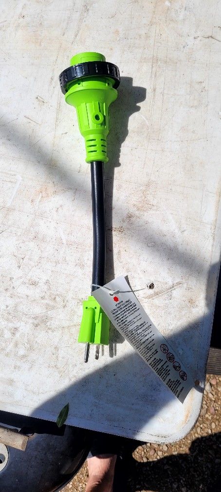 R V  to Household Pig tail adapter.