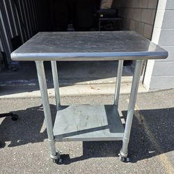 Stainless Steel Table 20x30 w locking caster wheels