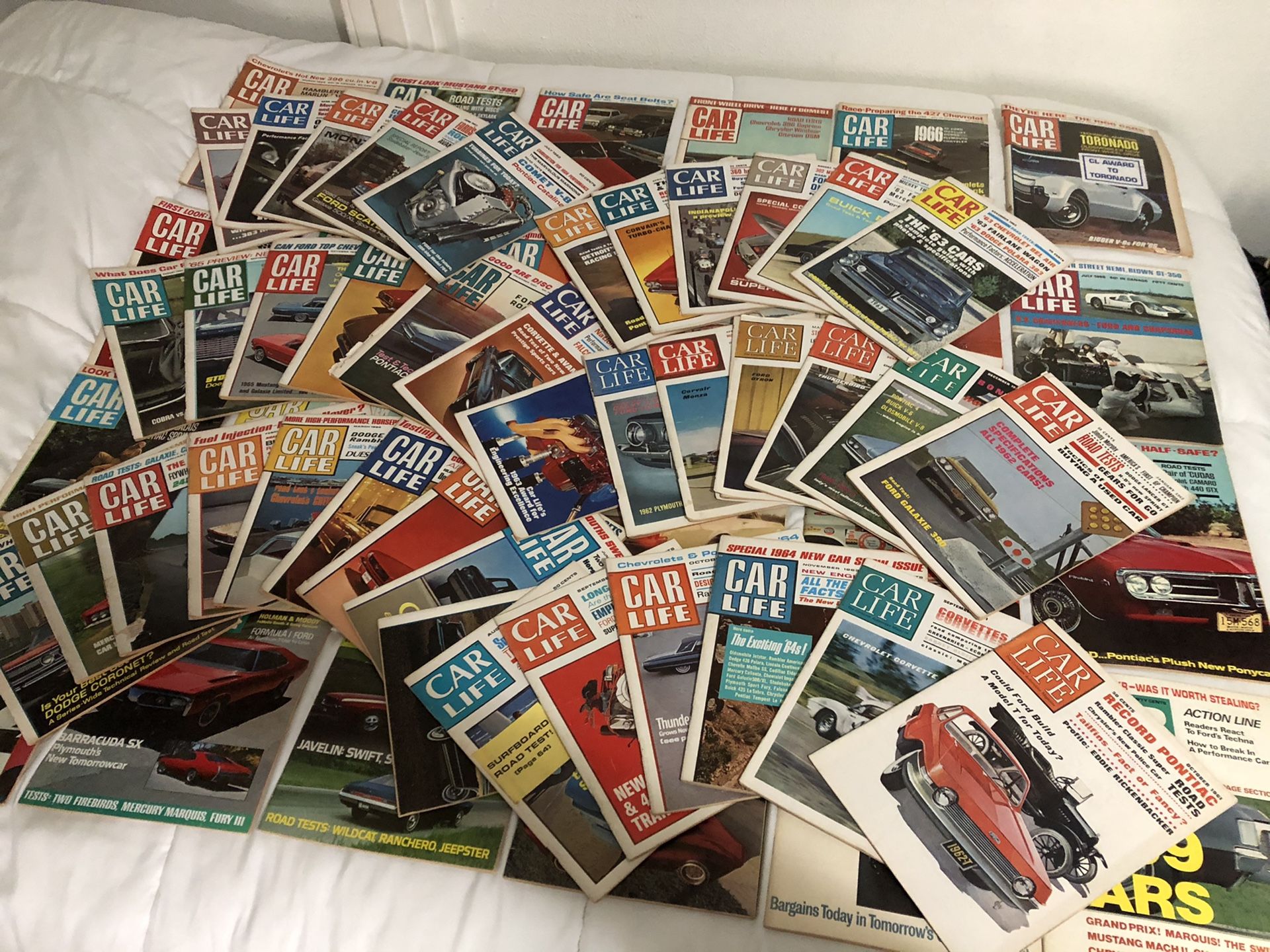 64 vintage collectible issues of Car Life Magazine