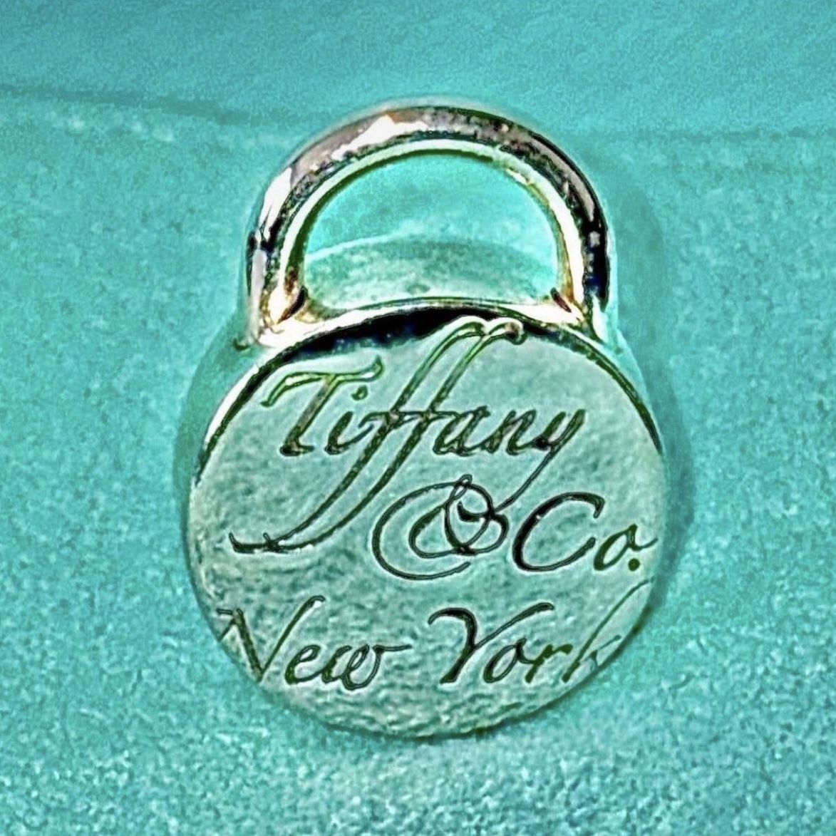 Tiffany & Co. Circle Notes Padlock Charm