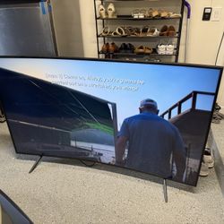 Curved Samsung 65” 4K TV (Model #: UN65NU7300)