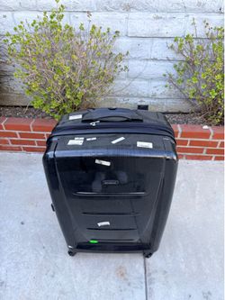 Samsonite large check in roller luggage