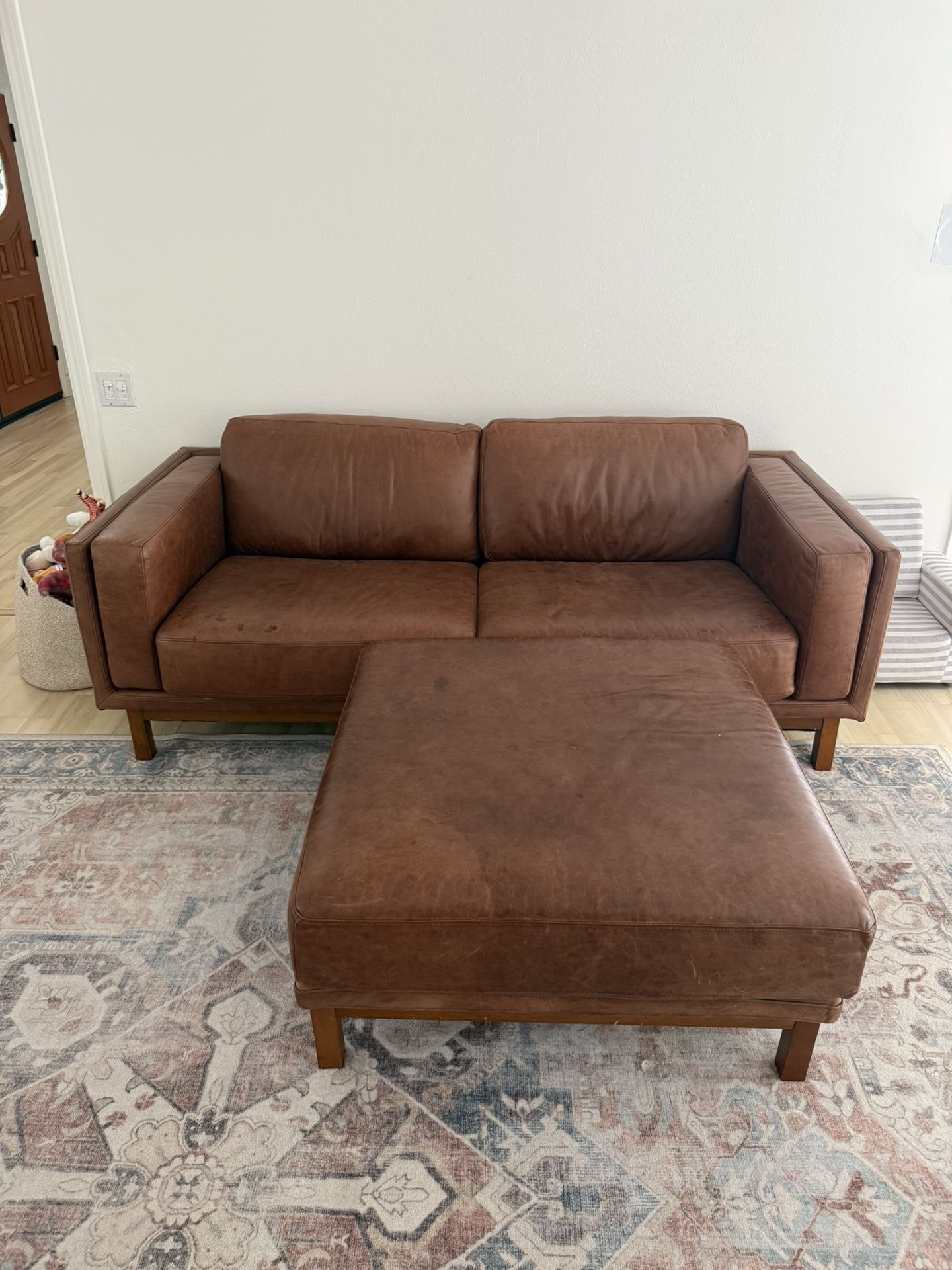 Leather Couch And Ottoman 