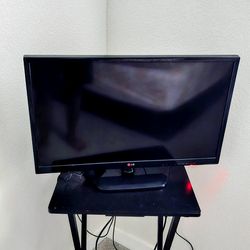 LG 32 inch LCD TV with Roku Stick and TV Table