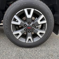 Four (4) Dunlop Tires