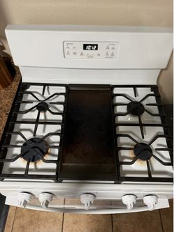 1 year old stove still new   Obo