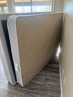 Box spring and mattress with rails