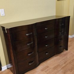 Clean and Nice Brown 12 Drawer Dresser.