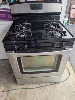 Black and stainless steel Amana gas stove