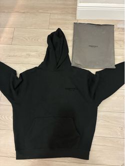 Brand new size medium black essentials hoodie