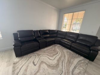 Dark brown leather couches