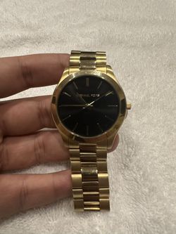 Michael Kore 44 mm gold watch