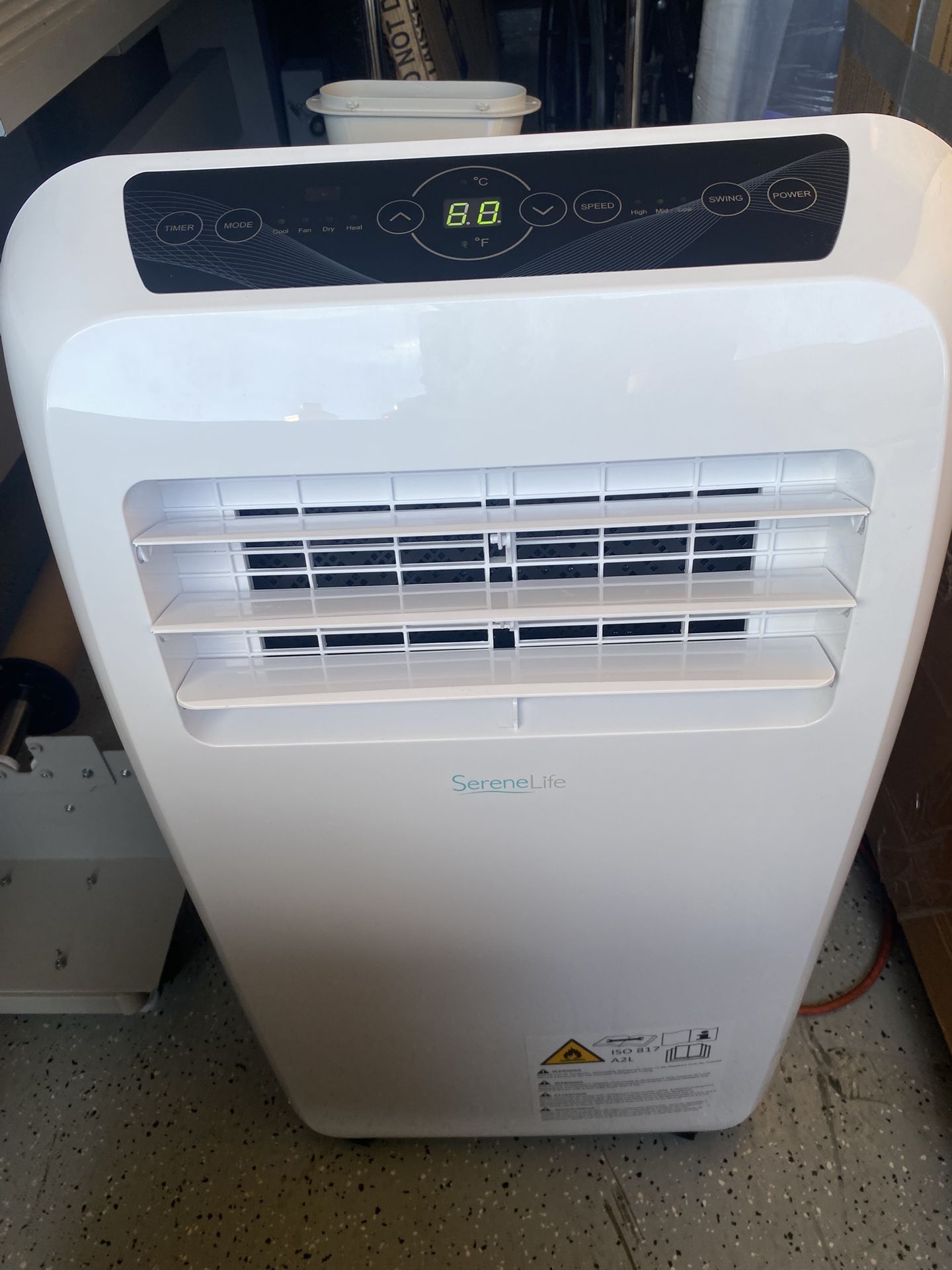 SereneLife 12000 BTU (DOE) Portable Air Conditioner Cools 550 sq ft with Heater and Dehumidifier Remote Control in White