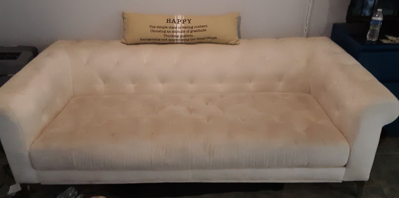 White tufted couch
