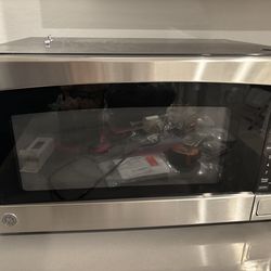 GE 2.0-cu ft 1200 -Watt Countertop Microwave ( Stainless )