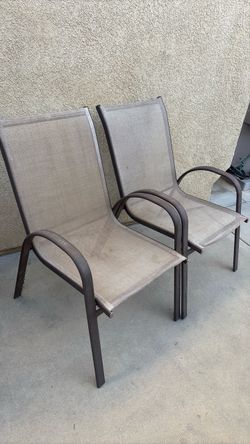 Two used patio chairs